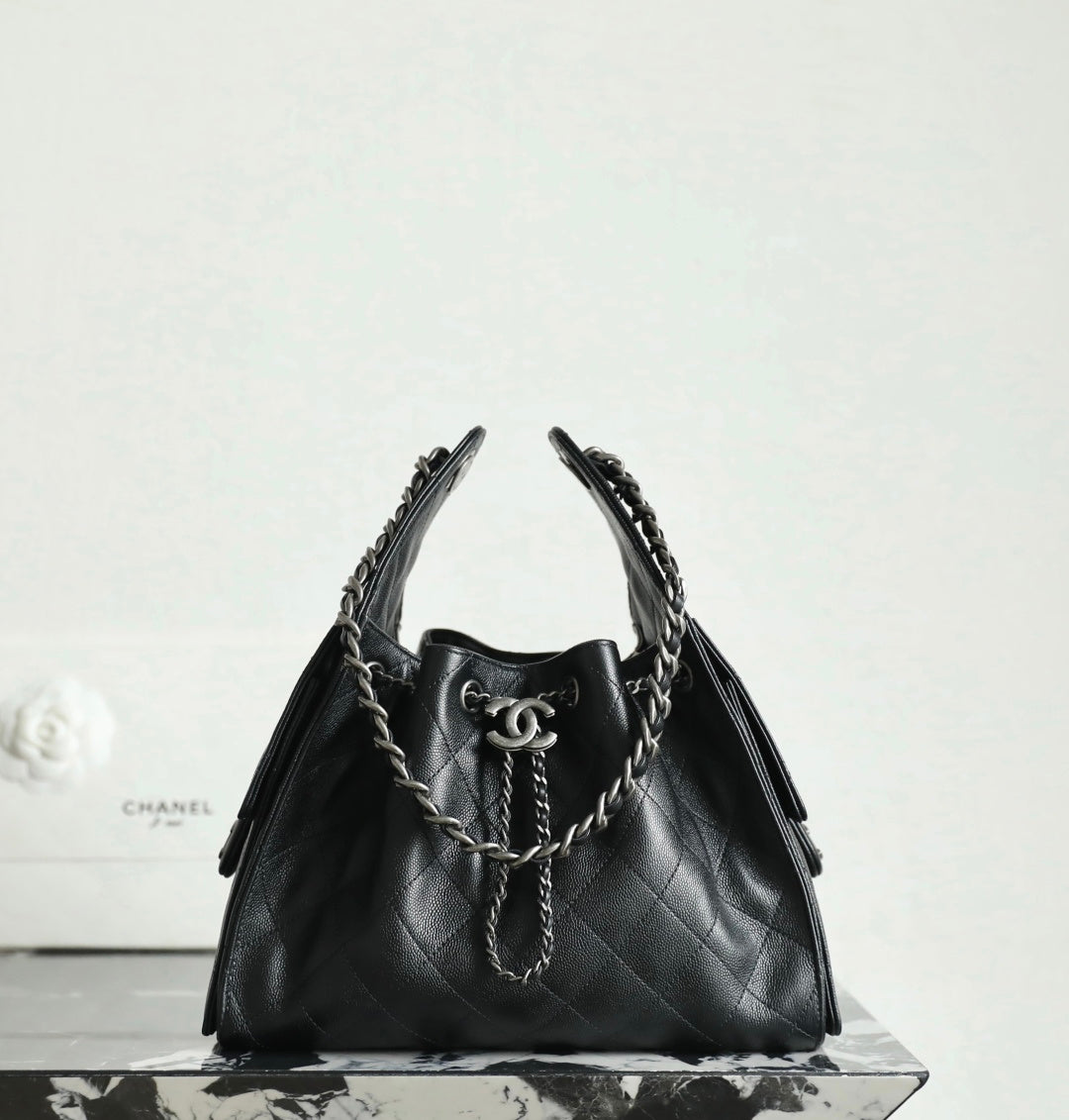 Chanel black quilted leather bucket bag with chain handles and CC clasp