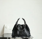 Chanel black quilted leather bucket bag with chain handles and CC logo