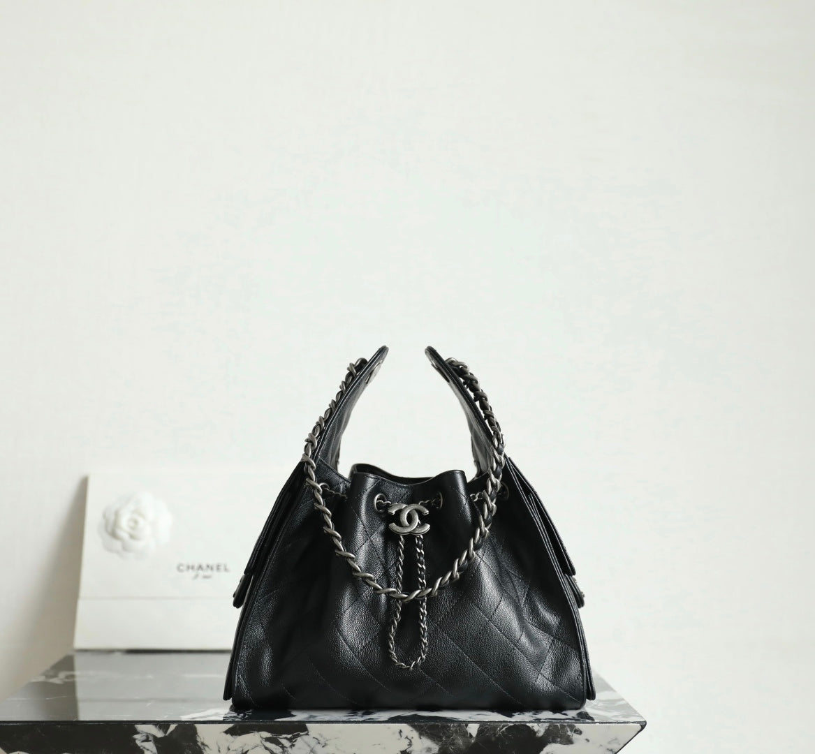 Chanel black quilted leather bucket bag with chain handles and CC logo