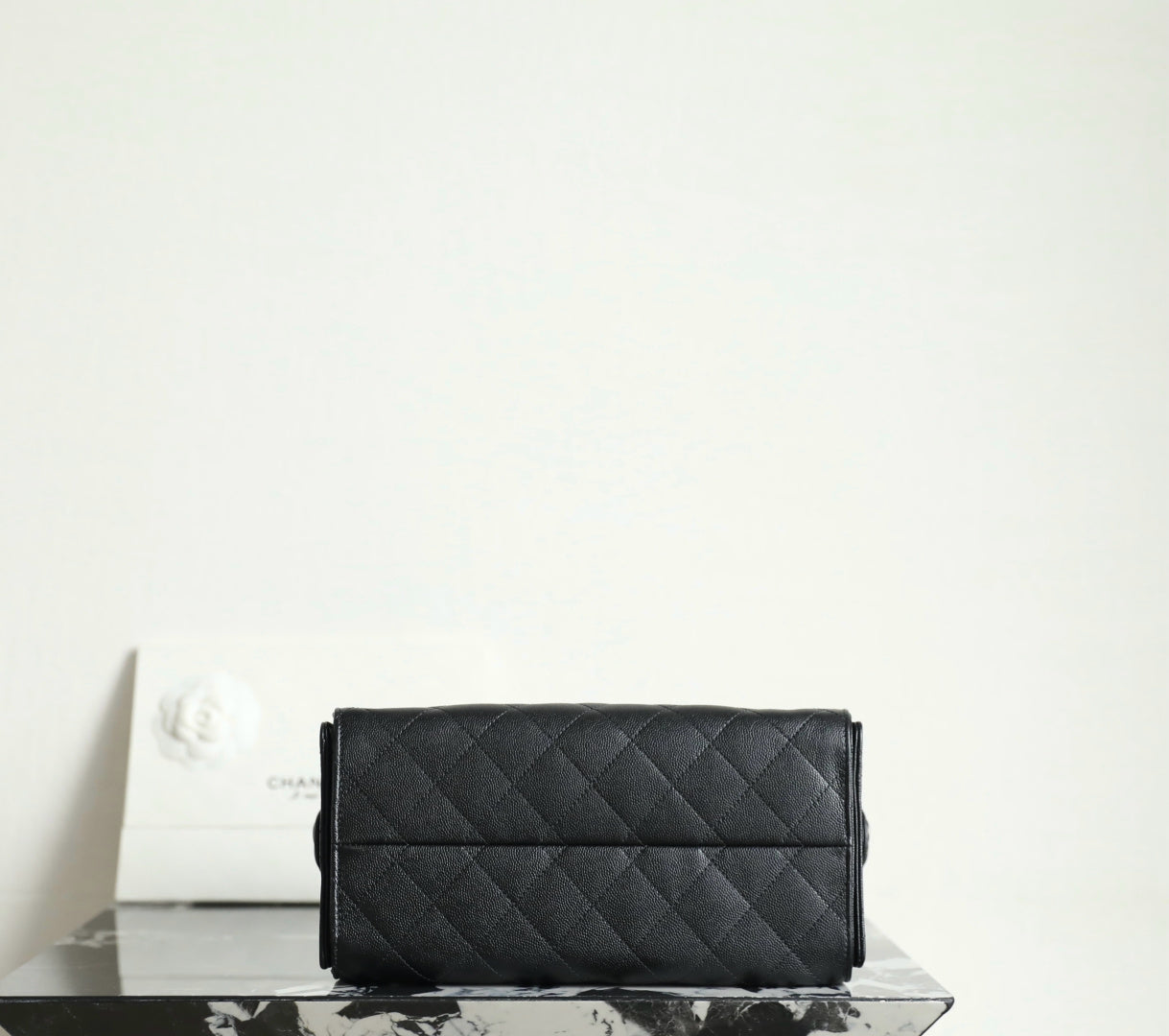 Chanel black quilted leather flap bag with chain strap