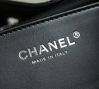 Chanel logo stamp on black leather lining, made in Italy
