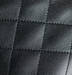 Chanel black quilted leather texture close-up with diamond stitching