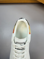 White sneaker heel with check trim and Burberry logo strap