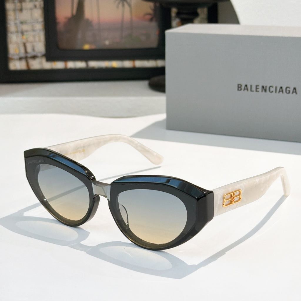 Balenciaga sunglasses, black frames with dark green gradient lenses