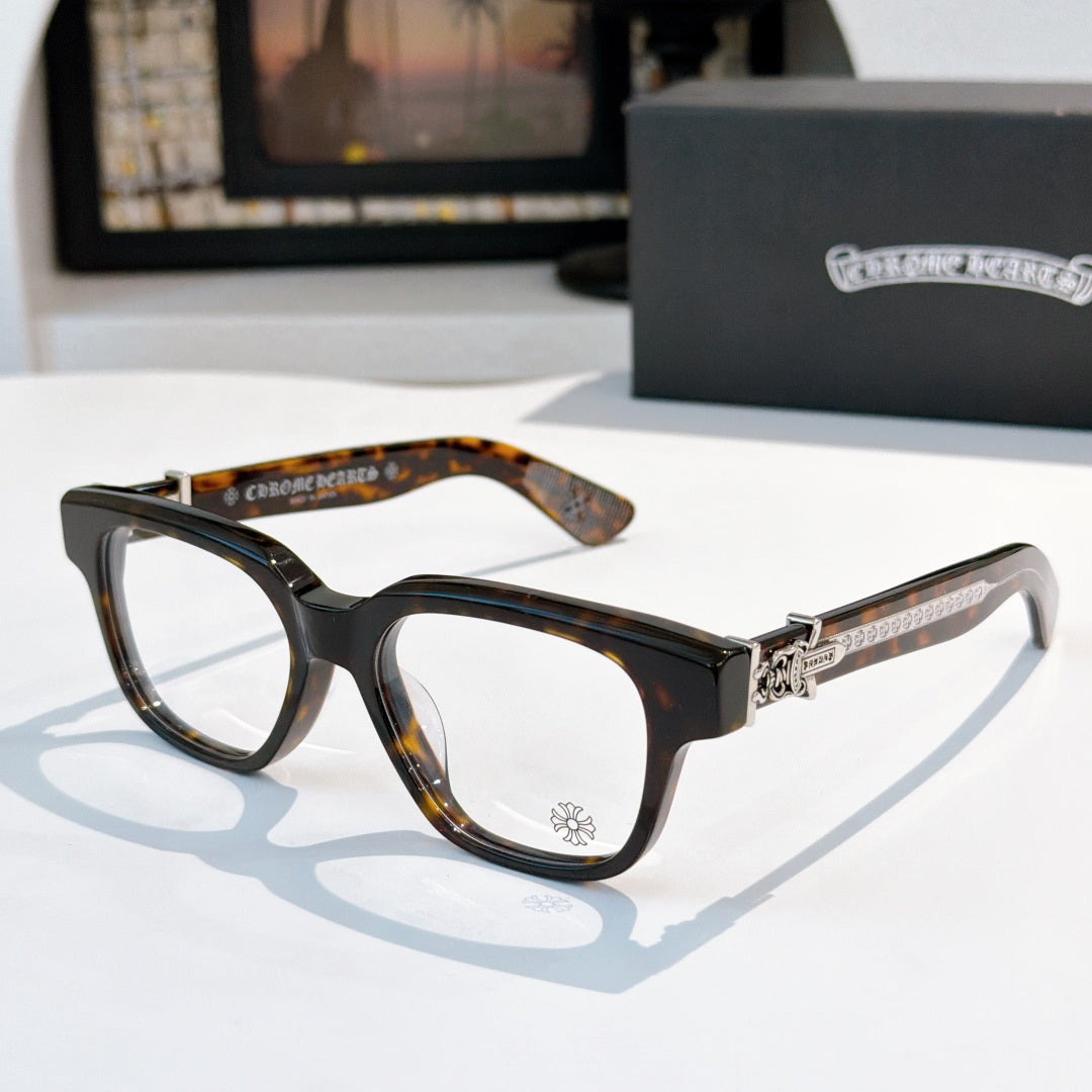 Black acetate eyeglasses with round-square frame and tortoise-pattern temple
