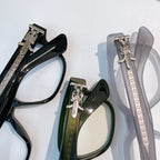 Set of eyeglasses frames and temples with metal hinges and decorative plates