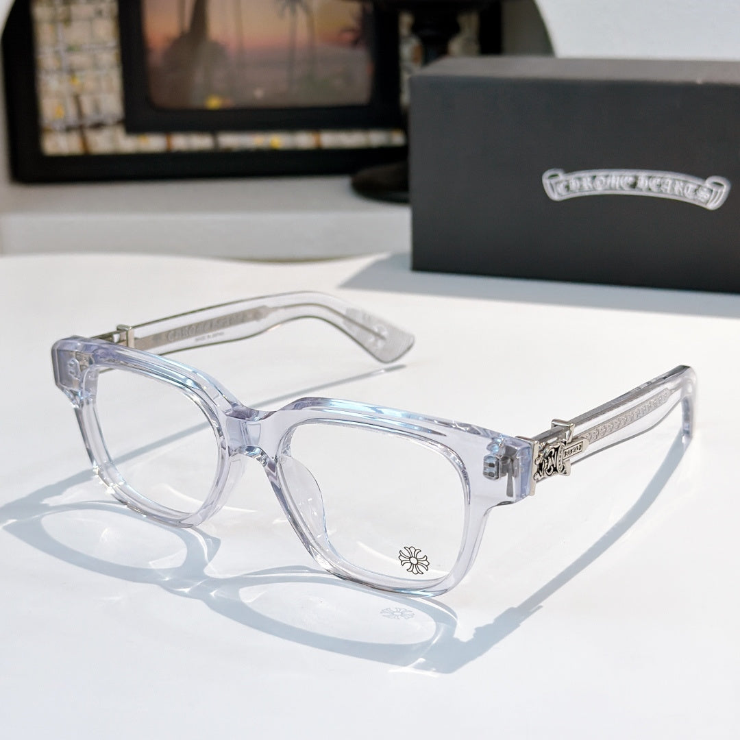 Clear acetate eyeglasses with large frame and metal decorative hinge