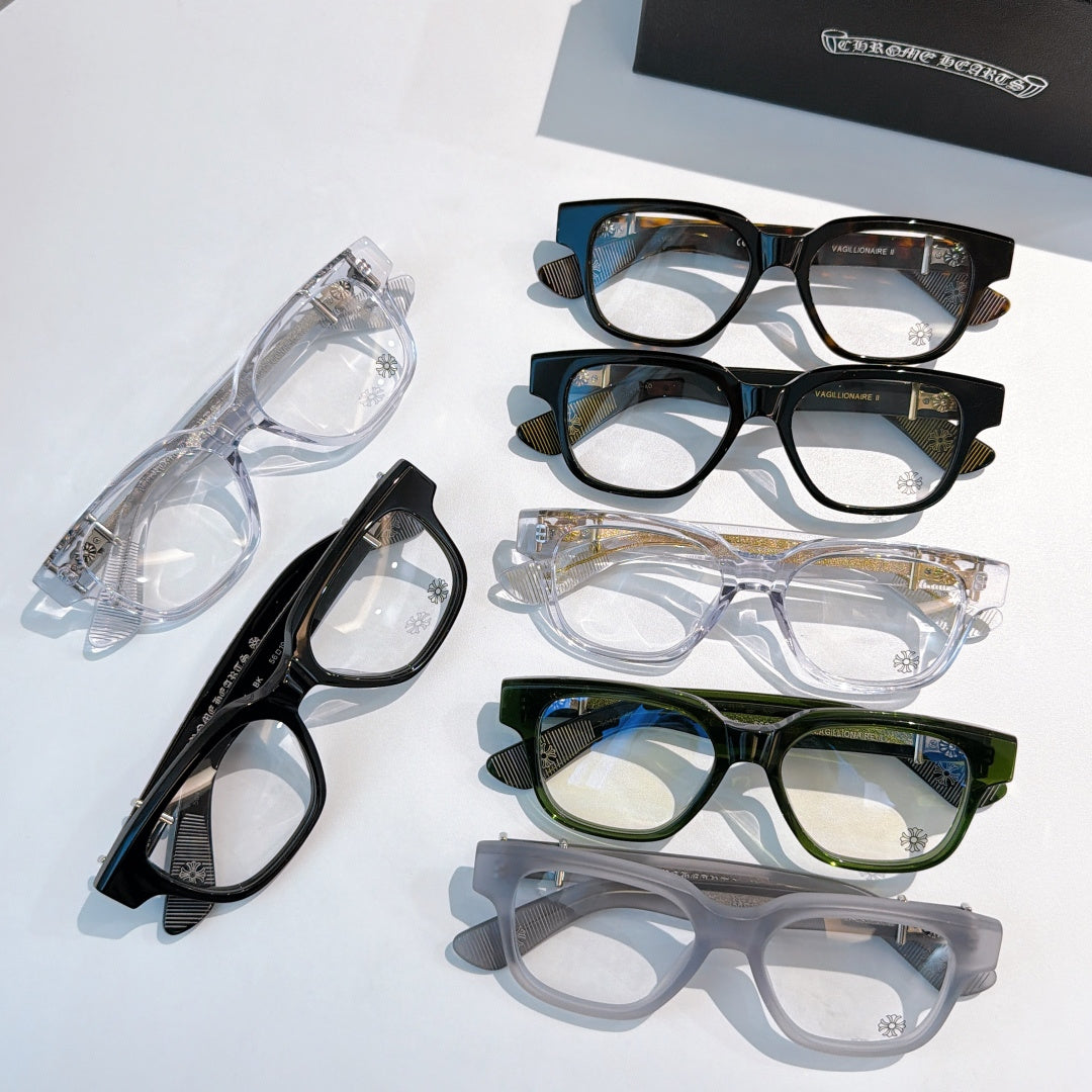 Assorted eyeglasses with clear, black, green, and gray frames on display