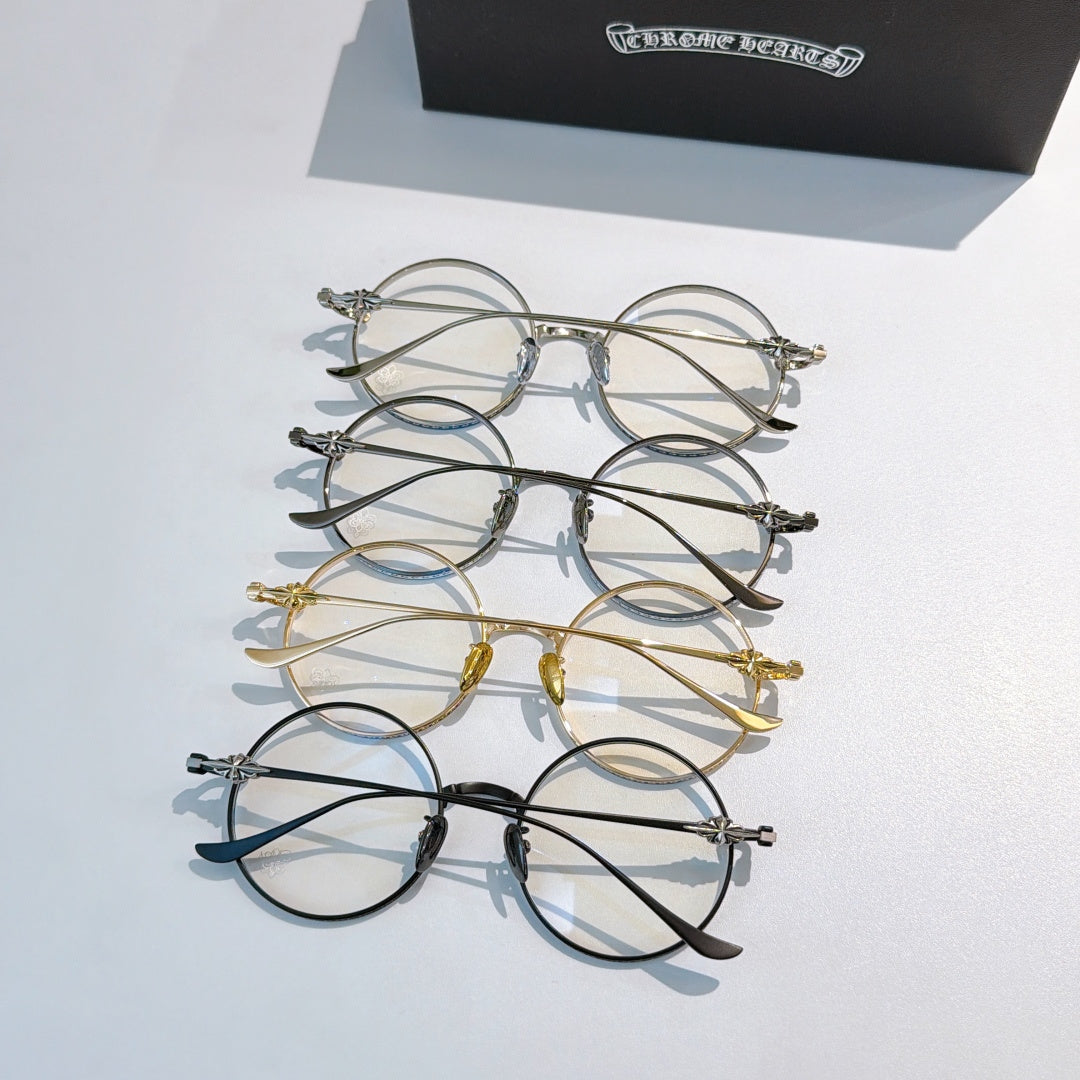 Assorted round eyeglasses set with chrome, gold, and dark frames displayed together.