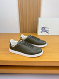Olive green leather sneakers, lace-up design with black laces and white rubber sole