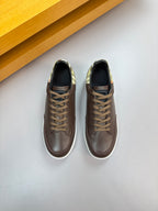 Brown lace-up sneakers with white midsoles and plaid lining at heel, pair view