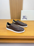 Brown leather Burberry sneakers with plaid heel collar and white rubber sole