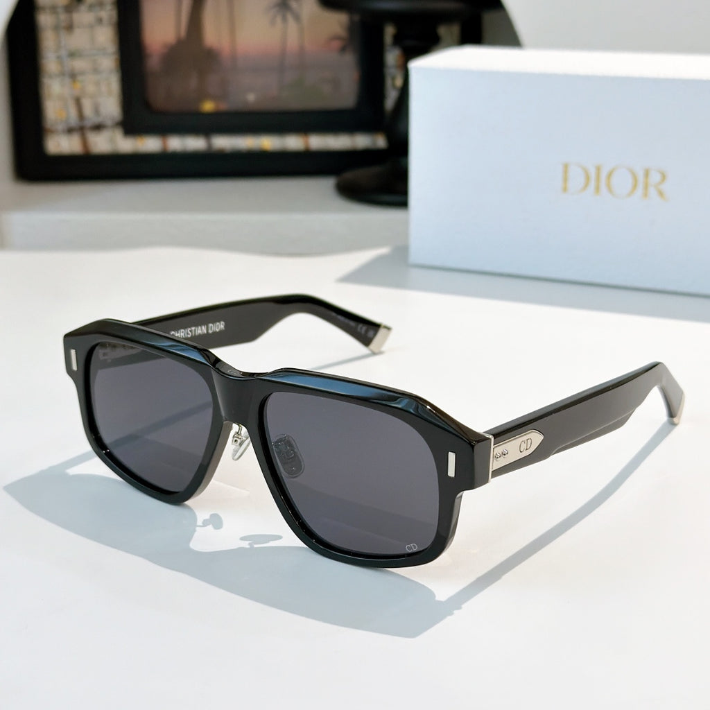 Black cat-eye sunglasses with dark lenses and silver-tone logo temple