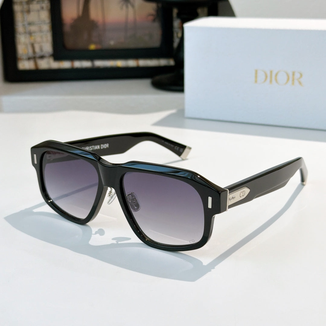 Black cat-eye sunglasses with purple-tinted lenses and silver-tone logo temple