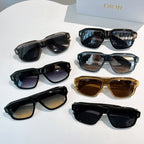 Assorted sunglasses in black, gold, blue, and brown with logo temples
