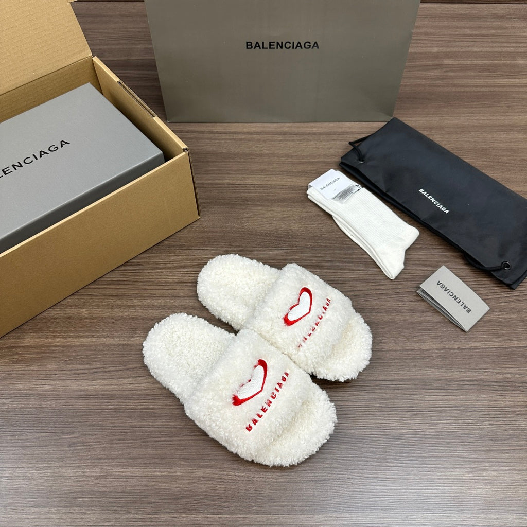 Balenciaga fuzzy white slide sandals with red logo on straps