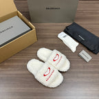 Balenciaga fuzzy white slide sandals with red logo on straps