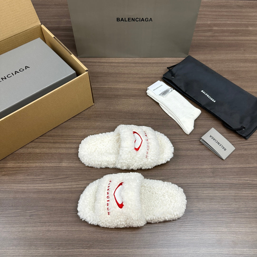 Balenciaga fuzzy white slide sandals with red curved logo on side