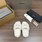 Balenciaga fuzzy white slide sandals with red logo on front strap