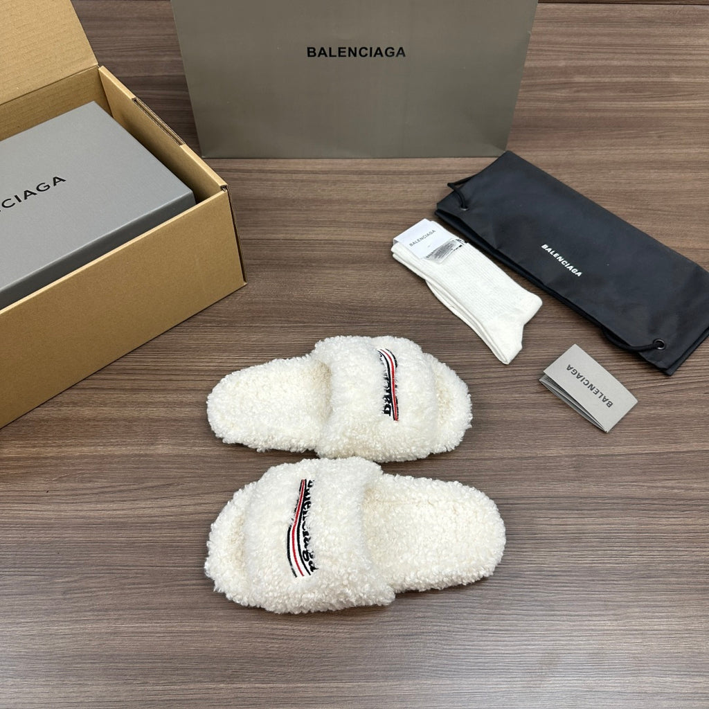 Balenciaga white teddy slide sandals with logo embroidery, side view