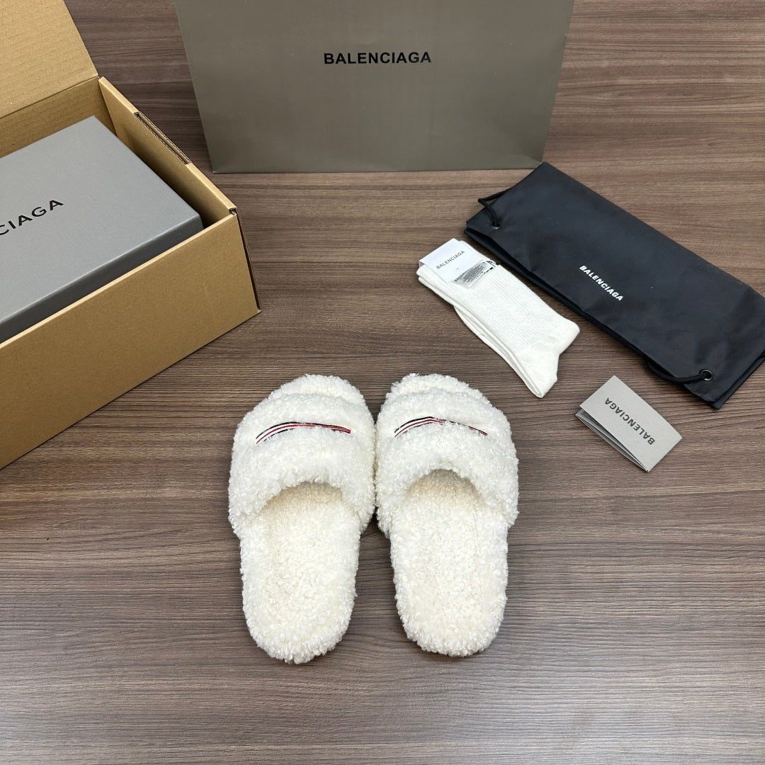 Balenciaga white teddy slide sandals, front view with striped trim
