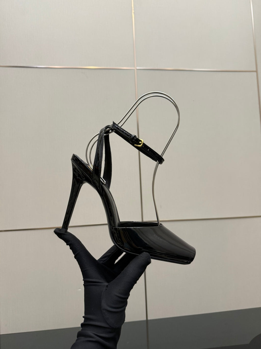 YSL ladies black patent heeled sandal with open toe and thin ankle straps