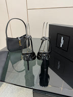 YSL ladies black patent heeled sandals, open toe silhouette, stiletto heel