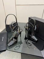 YSL ladies black patent heeled sandals with ankle strap and high stiletto heel