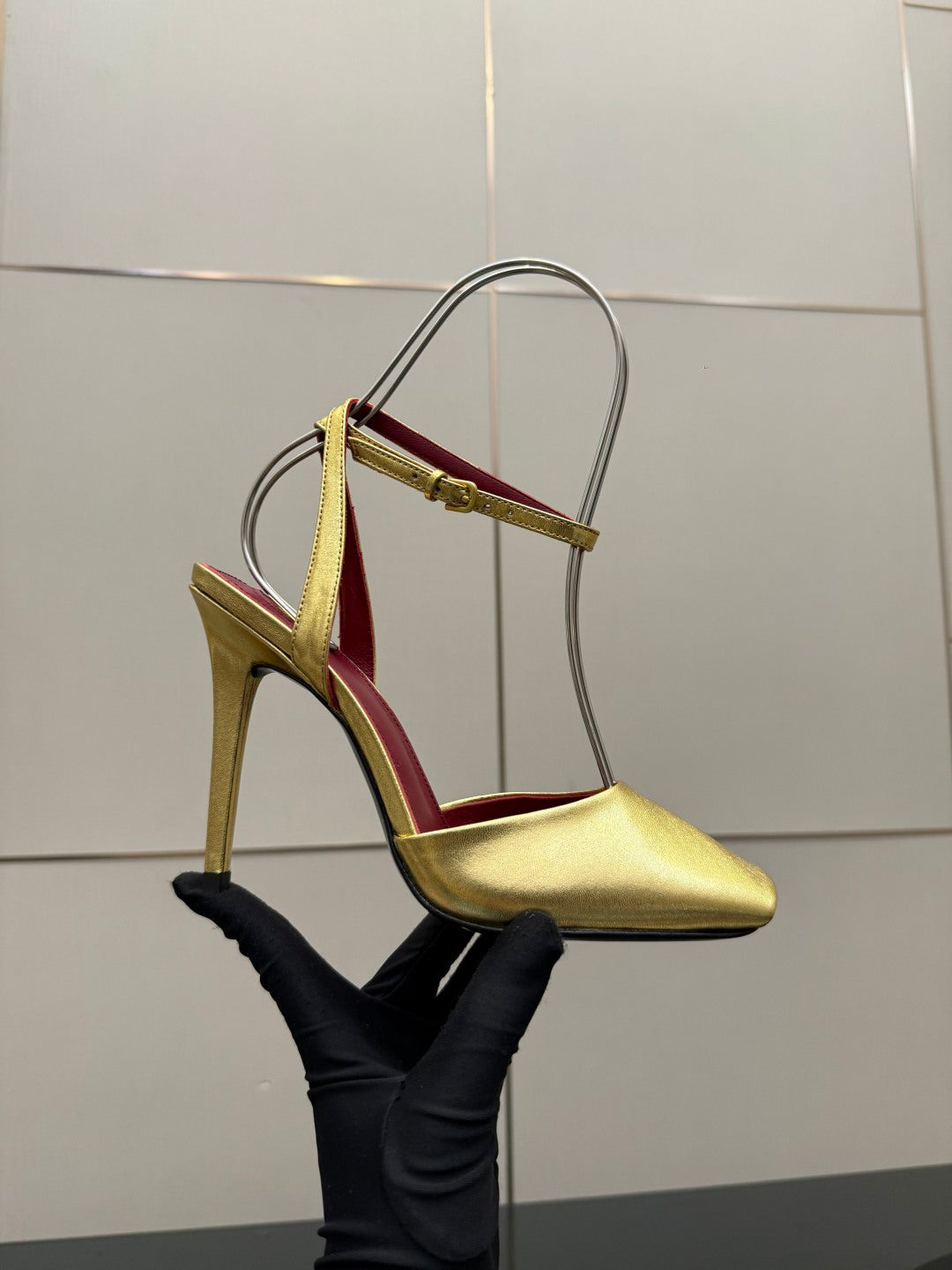 Women’s gold high-heel mule sandal with red insole and thin ankle strap