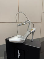 Silver open-toe high-heel sandal with thin ankle-strap and stiletto heel.