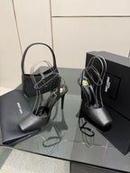 YSL black high-heel sandals pair with open toe and crisscross ankle strap design