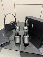 YSL black high-heel sandals with thin ankle straps and gold logo detail