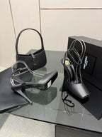 YSL black high-heel sandals angled view with smooth upper and slim stiletto heel