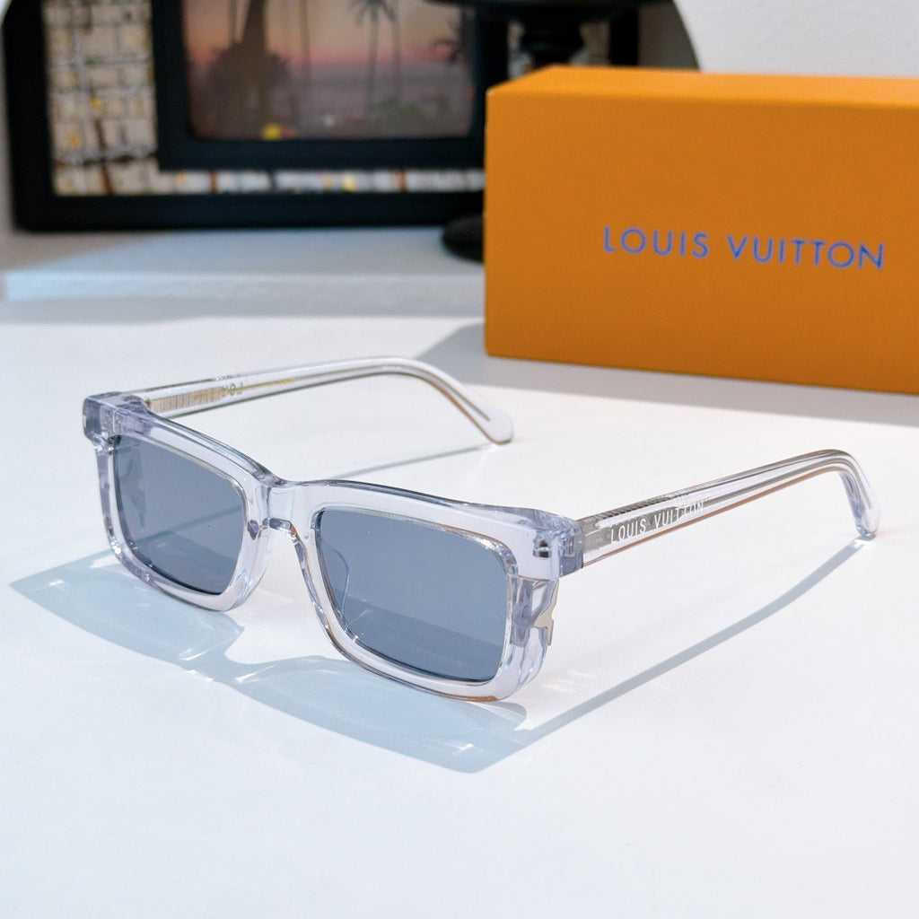 Louis Vuitton sunglasses with clear frames and dark blue gradient lenses