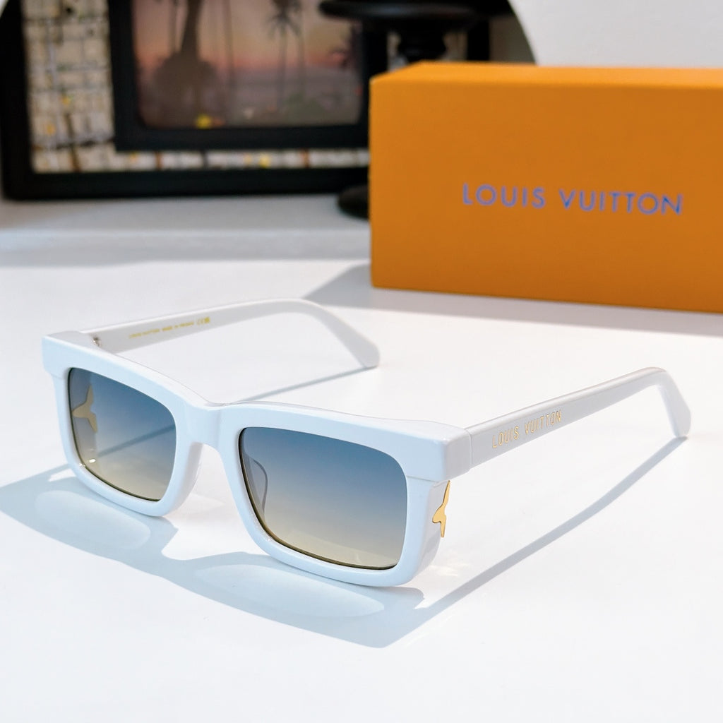 Louis Vuitton sunglasses with light blue frames and blue gradient lenses