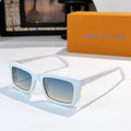 Louis Vuitton sunglasses with light blue frames and blue gradient lenses
