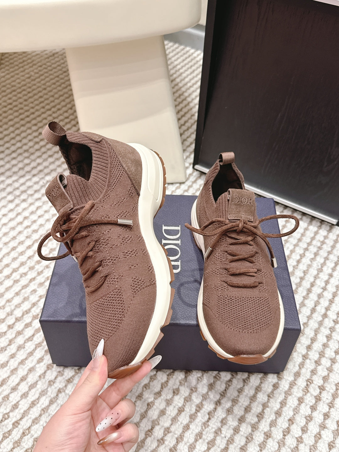Brown unisex knit lace-up sneaker with white sole and lace-up front