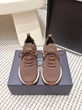 Brown unisex knit lace-up sneakers with cushioned sole and fabric pull tabs