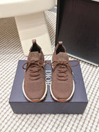 Brown unisex knit lace-up sneakers with cushioned sole and fabric pull tabs