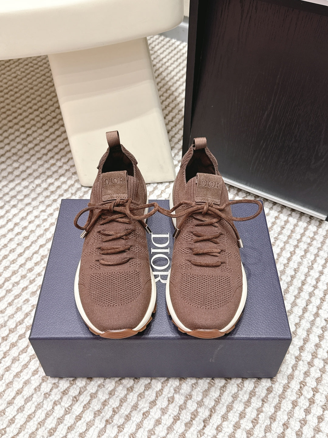 Brown unisex knit lace-up sneakers with cushioned sole and fabric pull tabs