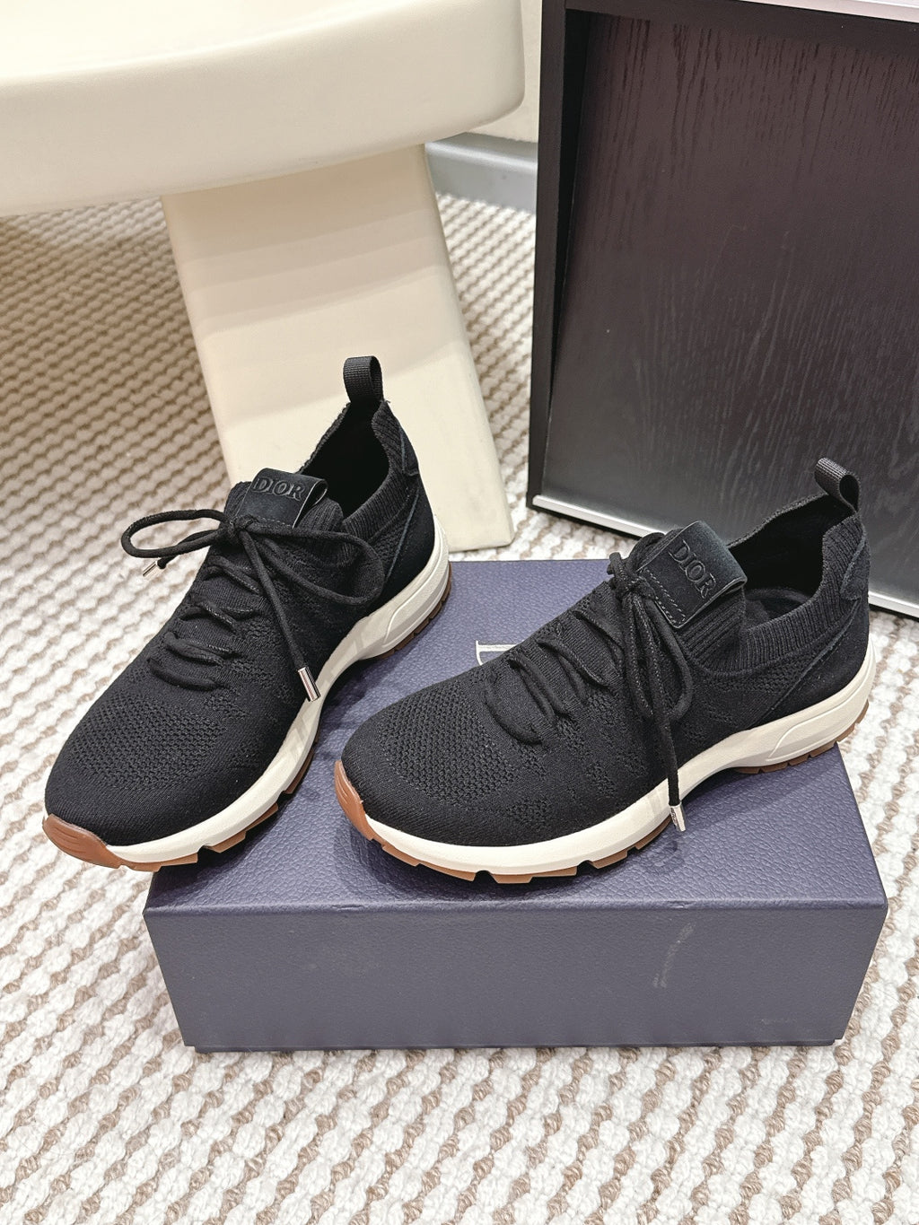 Black Dior unisex sneakers with sock-style collar and white sole