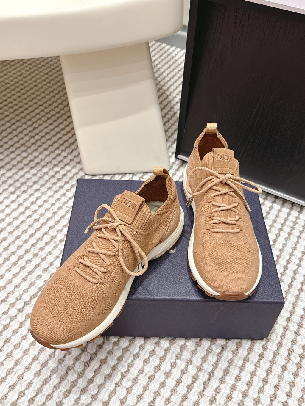 Beige Dior knit sneakers on box, lace-up design with white trim and round toe