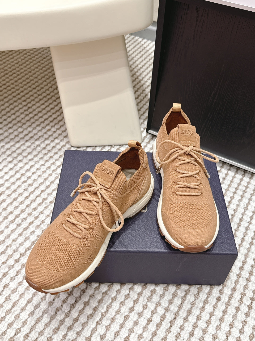 Beige Dior knit sneakers on box, lace-up design with white trim and round toe