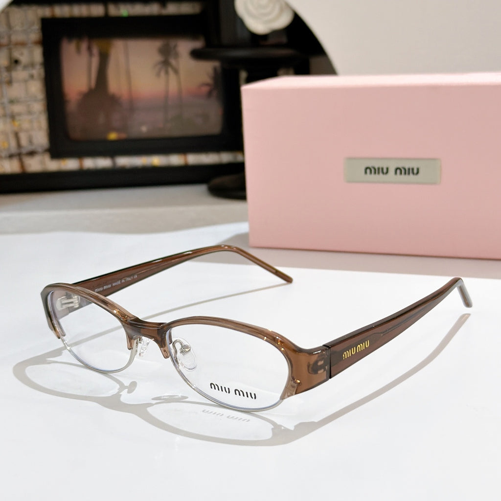 Miu miu eyeglasses with brown tortoiseshell frame and clear lenses, curved rectangular shape