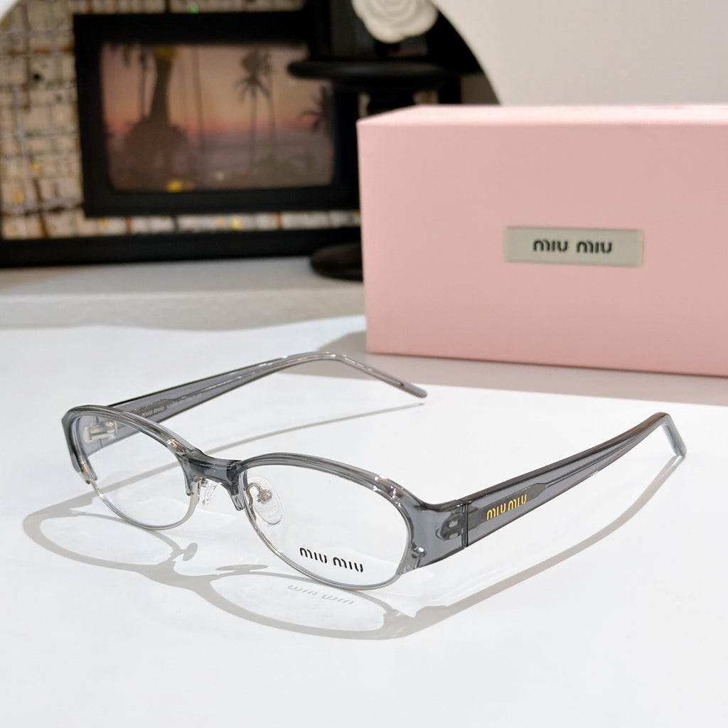 Miu miu eyeglasses with light frame and clear lenses, curved rectangular shape