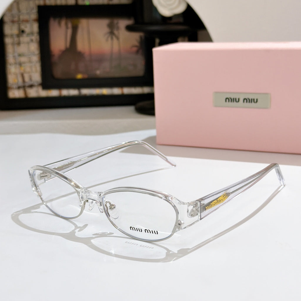 Miu miu eyeglasses with clear/metal frame and clear lenses, curved rectangular shape