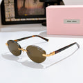 MiuMiu sunglasses with dark amber lenses, tortoiseshell frames and gold temples