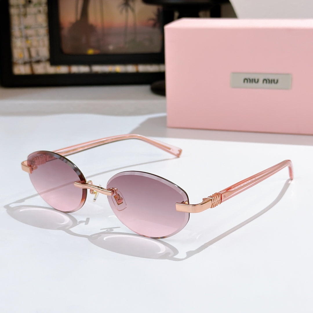 MiuMiu sunglasses with pink tint lenses, rose frames and gold temple details