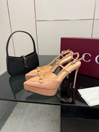 Beige slingback platform pumps with gold-tone buckle, pointed toe, stiletto heel