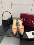 Beige slingback platform pumps with gold-tone buckle detail and high stiletto heel